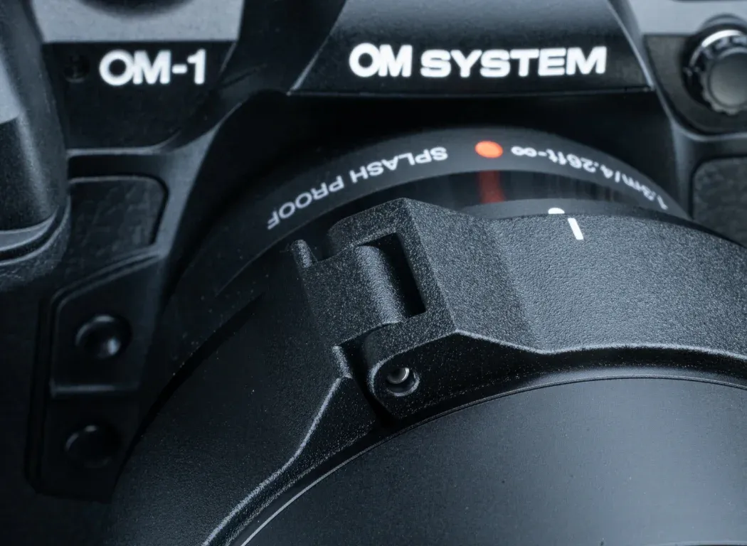 A closeup photo of the lens to show the tripod collar.